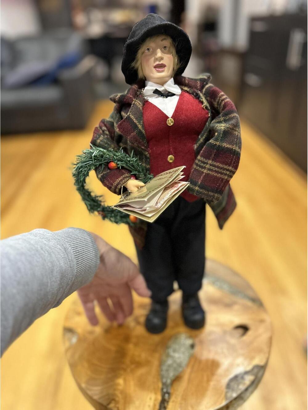 Dennis East International Christmas Caroler